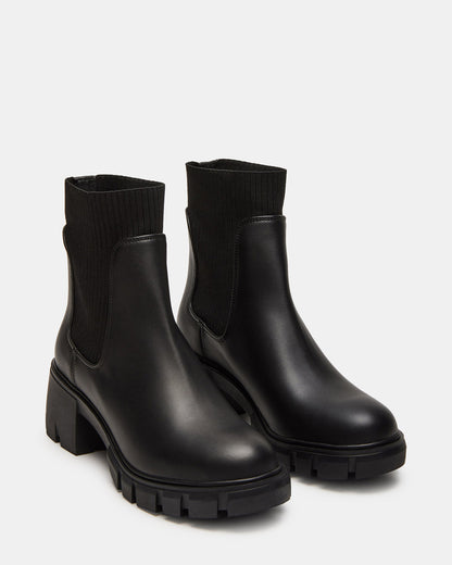 Steve Madden HUTCHH20 Black Water-Resistant Lug Sole Ankle Boot | Women's Booties